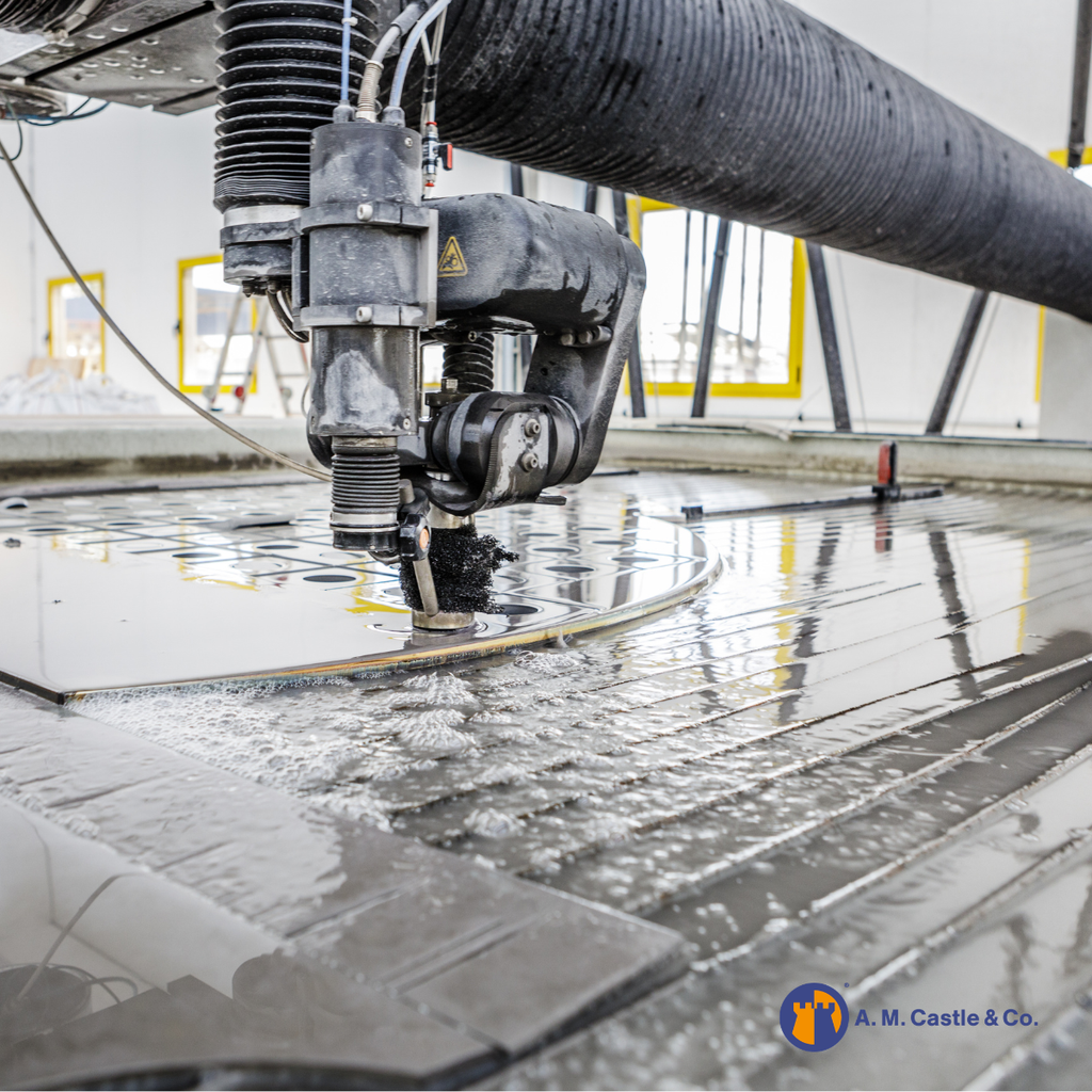 Waterjet cutting stainless steel aerospace components with high precision in a manufacturing facility 